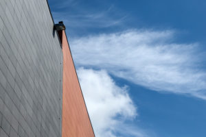 Symbol / Concepts, Wall House on the background of clouds Symbol / Concepts, Wall House on the background of clouds